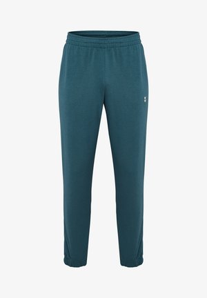 Pantalones jogger en color verde azulado, hechos de una suave mezcla de algodón. Cuentan con una cintura elástica y puños, con un pequeño logotipo blanco en el muslo izquierdo.