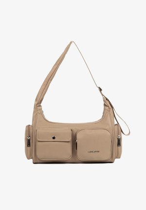 Sac à bandoulière beige avec plusieurs poches à l'avant et sur les côtés, fermetures éclair, et une poche à rabat, doté d'une sangle ajustable unique.