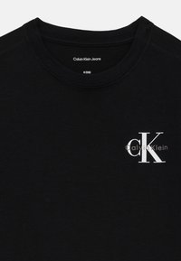 Calvin Klein Jeans CHEST MONOLOGO UNISEX - Marškinėliai su spaudiniu - black