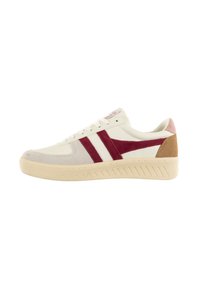 Sneakers with a cream upper, burgundy suede stripes, light grey toe cap, and brown heel accent; textured rubber sole with ridges.