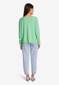 Rich & Royal Strickpullover - green tea