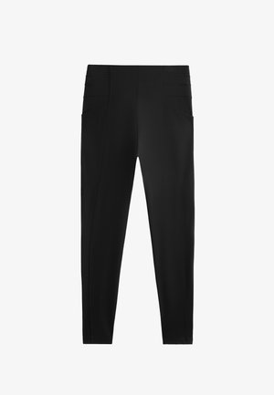 Leggings noirs au toucher lisse, avec des coutures ajustées, une taille élastique et des poches latérales pour plus de fonctionnalité.