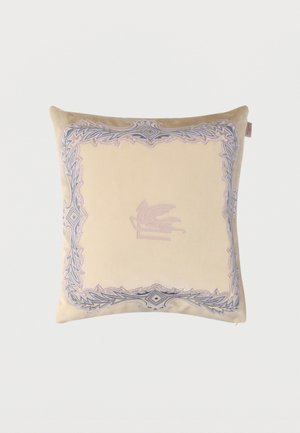 Beige square cushion with intricate gray and pink embroidered border and a central motif of a winged horse on a bench.