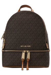 Brown canvas backpack with an all-over logo pattern, gold hardware, dual zippers, and tan leather accents at the top and bottom.