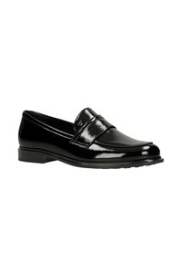 Mocassini in vernice nera con punta arrotondata, design slip-on e tacco basso impilato. Presentano una texture liscia e dettagli delle cuciture sottili.
