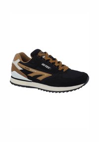 Black and brown athletic shoe featuring a suede and mesh upper, padded tongue, rubber sole, and white midsole with HI-TEC branding.