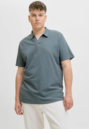 Grijze poloshirt met een gestructureerd patroon, korte mouwen en een drieknopenlijst. Een relaxte pasvorm aanvult het casual ontwerp.