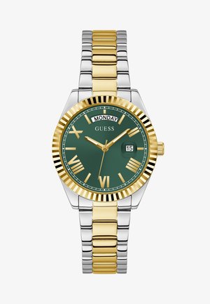 Gold and silver two-tone metal wristwatch with a green face, Roman numerals, date display, and a ridged gold bezel.