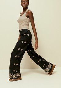 Next EMBROIDERED WIDE LEG - Tygbyxor - black