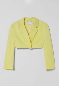 Zkrácený žlutý blazer s dlouhými rukávy, klopami a hladkým textilním povrchem. Vyznačuje se minimalistickým designem a předním zapínáním.