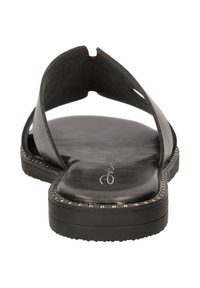 Black flat sandal with a split toe design, smooth leather upper, and textured insole. Accented with studded detailing along the sole edge.