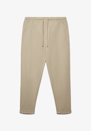 Beige Sweatpants mit elastischem Bund, verstellbarem Kordelzug, seitlichen Taschen und Bündchen an den Knöcheln. Hergestellt aus weichem, flexiblem Material.