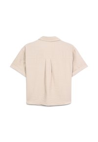 Camicia beige a maniche corte con colletto, dotata di una piega sul retro e tessuto leggermente strutturato. Design semplice e squadrato senza motivi visibili.