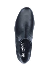 Schwarze Leder-Schlüpfschuh mit glatter Oberfläche, elastischen Seitenpanels und geprägtem Logo auf der Innensohle. Elegantes, abgerundetes Design der Zehenpartie.