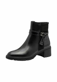 Bottines noires avec une tige en cuir lisse, un panneau texturé à motif crocodile, une sangle réglable et un petit talon carré. Semelle en caoutchouc pour une meilleure adhérence.
