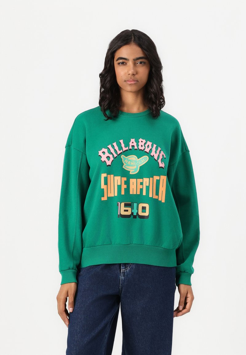 Felpa verde dalla vestibilità comoda, con polsini e orlo a coste. Presenta un audace testo grafico "BILLABONG" e "SURF AFRICA 1640" in colori a contrasto.