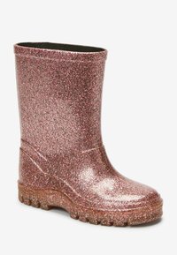 Botte de pluie rose scintillante, de taille enfant, avec une semelle texturée et une hauteur jusqu'au mollet, conçue pour protéger par temps humide.
