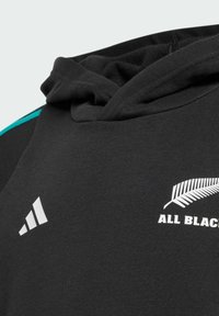 Felpa nera con pattina e cordino, presenta dettagli turchesi e stampa bianca del logo "All Blacks" e del marchio Adidas.