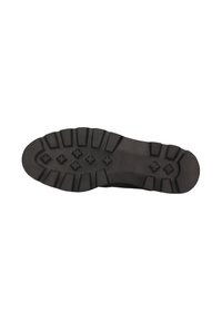 Suela de bota de goma negra con profundas y gruesas estrías y patrones de agarre en forma de diamante en las áreas central y del talón.