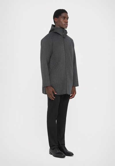 Gray wool coat with a hood, featuring a front zipper, side pockets, and a straight cut, paired with black trousers and shoes.