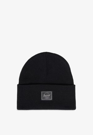 Schwarze Strickmütze mit umgeschlagenem Bündchen und einem kleinen rechteckigen Herschel-Label in der Mitte vorne.