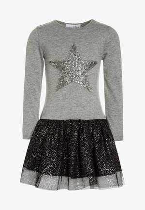 Szara sukienka z długim rękawem z cekinową srebrną gwiazdą na korpusie i czarną błyszczącą tiulową spódnicą o warstwowej konstrukcji.