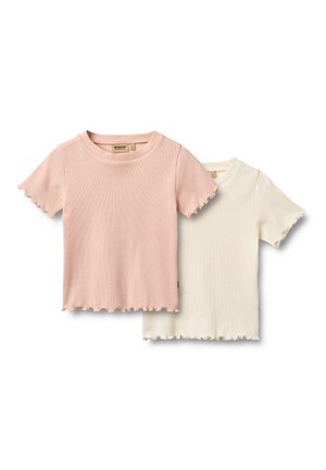 Kortærmede t-shirts i lyserød og creme, med ribbet tekstur og bølget kant. Labels synlige nær sidesømme.