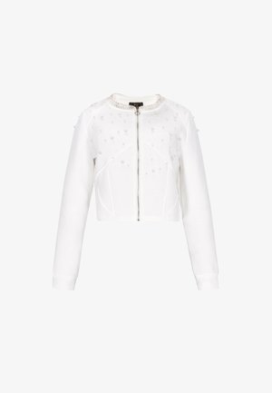 Veste blanche courte à manches longues ; dotée d'une fermeture éclair et d'embellissements décoratifs en perles sur le buste. Texture lisse, coupe ajustée.