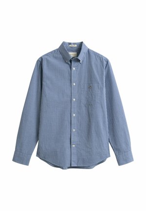 Chemise à manches longues à carreaux bleus et blancs, boutonnée avec un col et un petit logo brodé sur la poche poitrine.