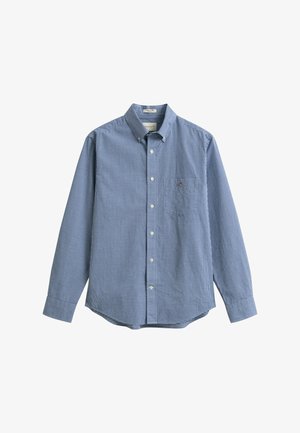 Chemise à manches longues à carreaux bleus et blancs, boutonnée avec un col et un petit logo brodé sur la poche poitrine.