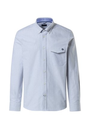 Camisa de botones a rayas en azul claro y blanco. Cuenta con un bolsillo en el pecho, cuello abotonado y mangas largas con puños abotonados.