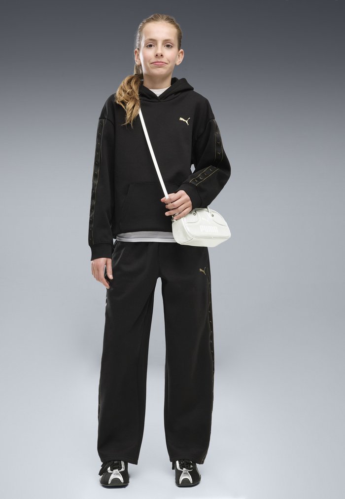 PUMA ESSENTIALS TAPE RELAXED JOGGINGHOSE - Tracksuit bottoms - black