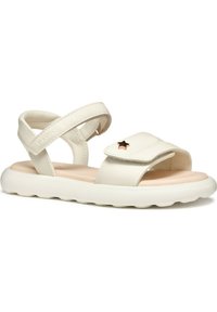 Sandali bianchi in pelle con fasce incrociate, chiusura regolabile in velcro e dettaglio a stella. Suola morbida e imbottita con bordi arrotondati.