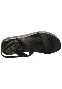 Sandale en cuir noir avec un design de bride, semelle rembourrée et motif floral sur la semelle intérieure. Surface texturée et détail de boucle réglable.