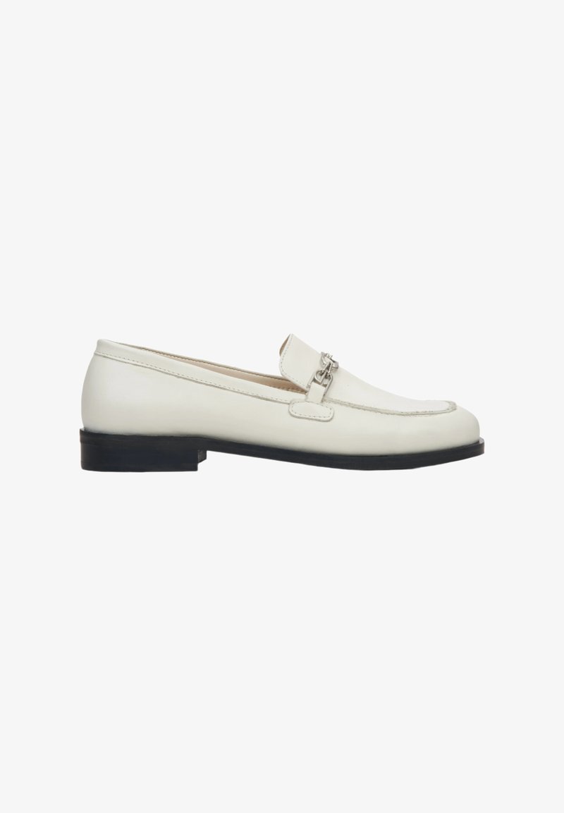 White leather loafers with a low black sole, featuring a decorative silver chain accent on the upper and stitched detailing along the edges.