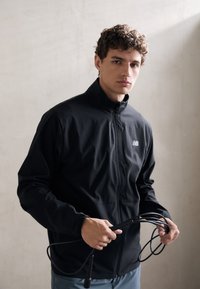 New Balance - ATHLETICS  - Training jacket - black Thumbnail Image 1