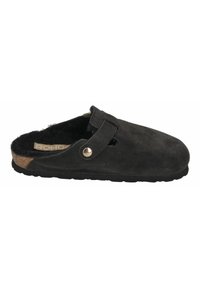 Black suede clog with a soft interior, adjustable strap, and a cork footbed. Features a round toe and a textured rubber sole.