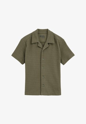 Žaliosios alyvuogės spalvos trumpomis rankovėmis marškiniai, pagaminti iš tekstūruoto audinio. Savybės: smailus apykaklė ir šeši derantys mygtukai priekyje.