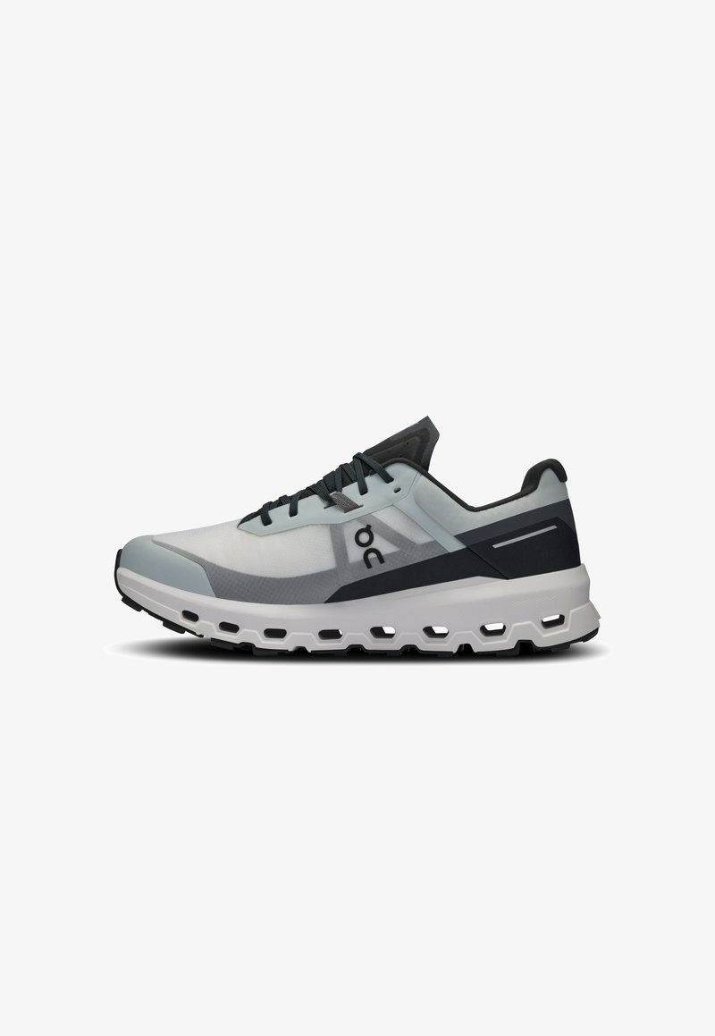 Lightweight running shoe in light blue and black, featuring a mesh upper, cushioned sole, and hexagonal cutouts for breathability.