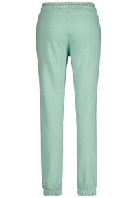 Lichtgroene sweatpants met elastische tailleband en boorden, gezien vanuit de achterkant, met zijzakken.