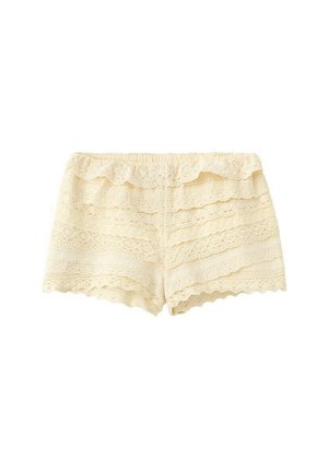 Shorts en dentelle couleur crème avec bords en feston et taille élastique à volants, présentant des motifs floraux superposés.