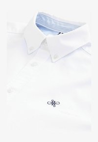 Wybrany, white