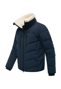 Giacca puffer blu navy con colletto in pelliccia sintetica rimovibile, chiusura frontale con zip, due tasche sul petto e polsini a coste. Design trapuntato e testurizzato.
