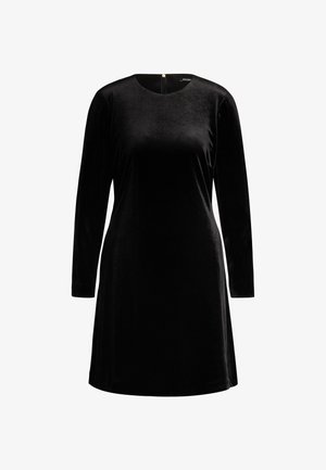 Abito in velluto nero con maniche lunghe, scollatura rotonda e chiusura a cerniera sul retro. Tessuto liscio con una vestibilità ampia.