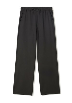 Black, wide-leg, elastic waist pants with a drawstring, featuring side pockets and a smooth, lightweight fabric finish.