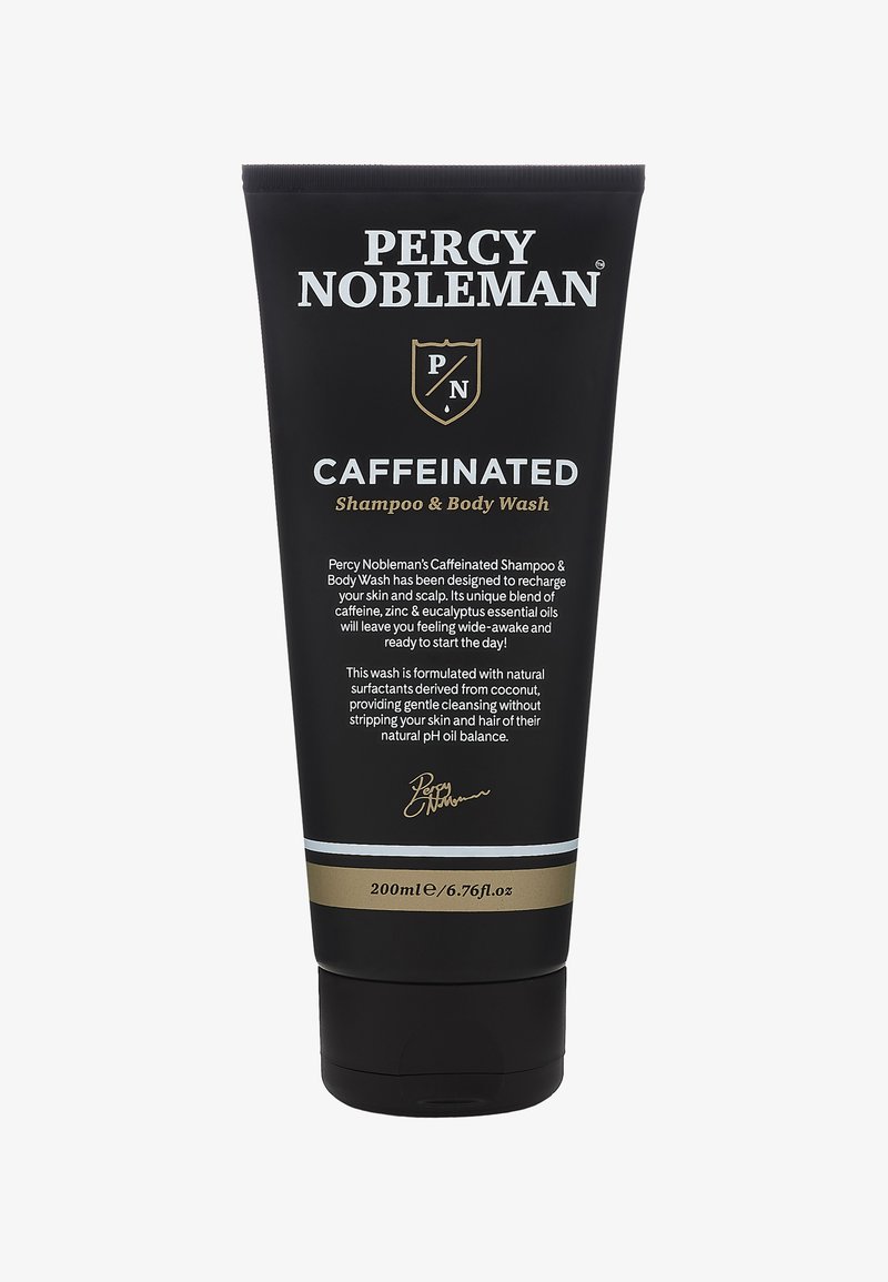Tube noire avec des accents argent et or. Présente le texte "CAFFEINÉ" en blanc gras. Contient 200 ml de shampooing et de gel douche.