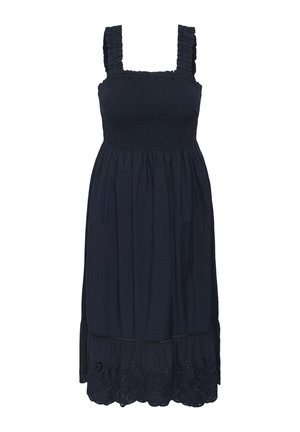 Vestido sin mangas azul marino con cuerpo fruncido, tirantes con volantes, falda fruncida y dobladillo de encaje de ojales.