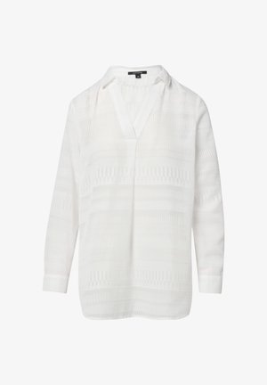 Biała bluzka z teksturowanej tkaniny, z dekoltem w kształcie litery V, długimi rękawami i geometrycznymi wzorami wplecionymi w materiał.