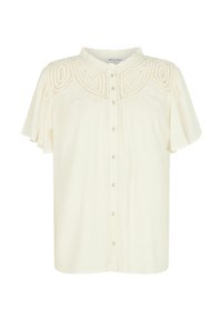 Cream-colored blouse with short ruffled sleeves, button front, and textured embroidery across the chest. Soft, lightweight fabric.