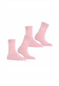 Trois paires de chaussettes en mélange de coton rose avec des poignets côtelés, une texture lisse et des motifs en forme de cœur sur le côté.